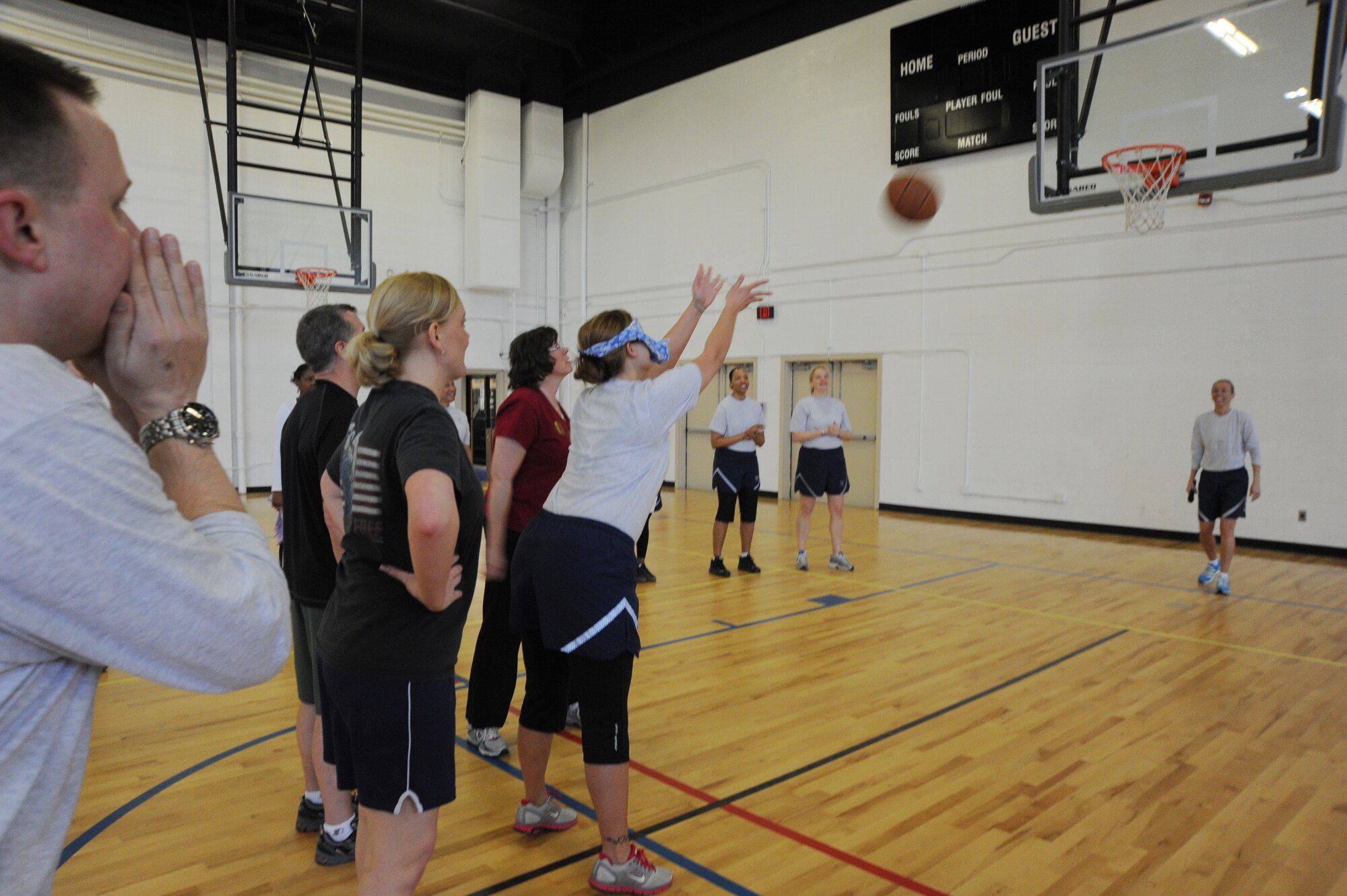 Staff Sgt. Stephanie Marsh, Air Force District of Washington logistics and
readiness executive assistant, throws the tie-breaker March 1 at the West
Fitness Center, Joint Base Andrews, Md., in the blind free throw
competition. The February Fitness Challenge capstone event featured a relay
race, medicine ball toss, blind free throws, a three-legged race and Dodge
ball. (U.S. Air Force photo by Airman 1st Class Tabitha N. Haynes)
