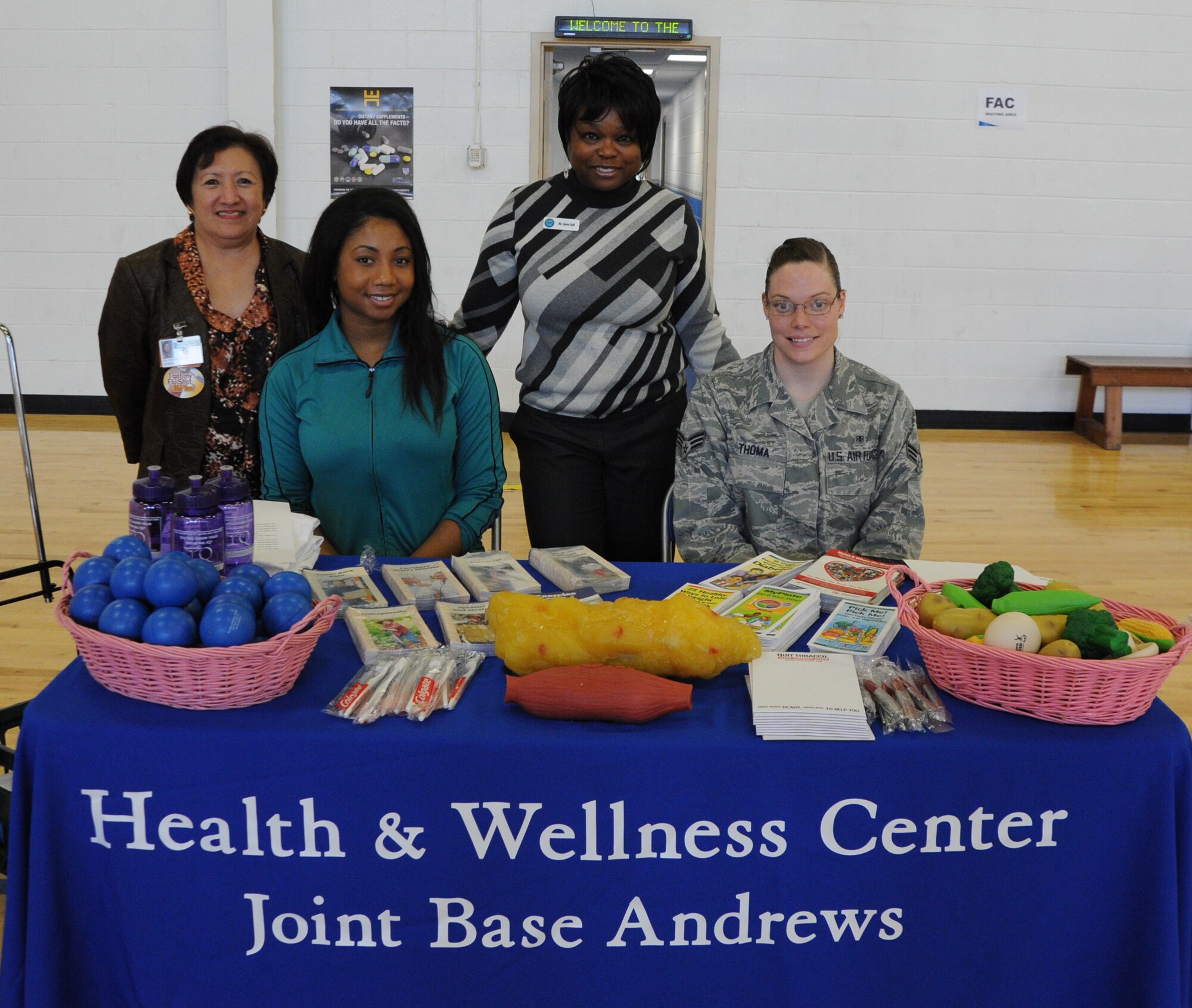 Marilou Castro, Health and Wellness Center dietician; Nicole Simpson, Health
and Wellness Center health promotion technician; Sylvia Goff, Health and
Wellness Center health promotion manager; and Senior Airman Angela Thoma,
Health and Wellness Center diet technician, brief Air Force District of
Washington Airmen March 1 at the West Fitness Center, Joint Base Andrews,
Md. The February Fitness Challenge capstone event featured guest speakers
from the fitness center, Health and Wellness Center, Family Advocacy and
resiliency flight on JBA. (U.S. Air Force photo by Airman 1st Class Tabitha
N. Haynes)
