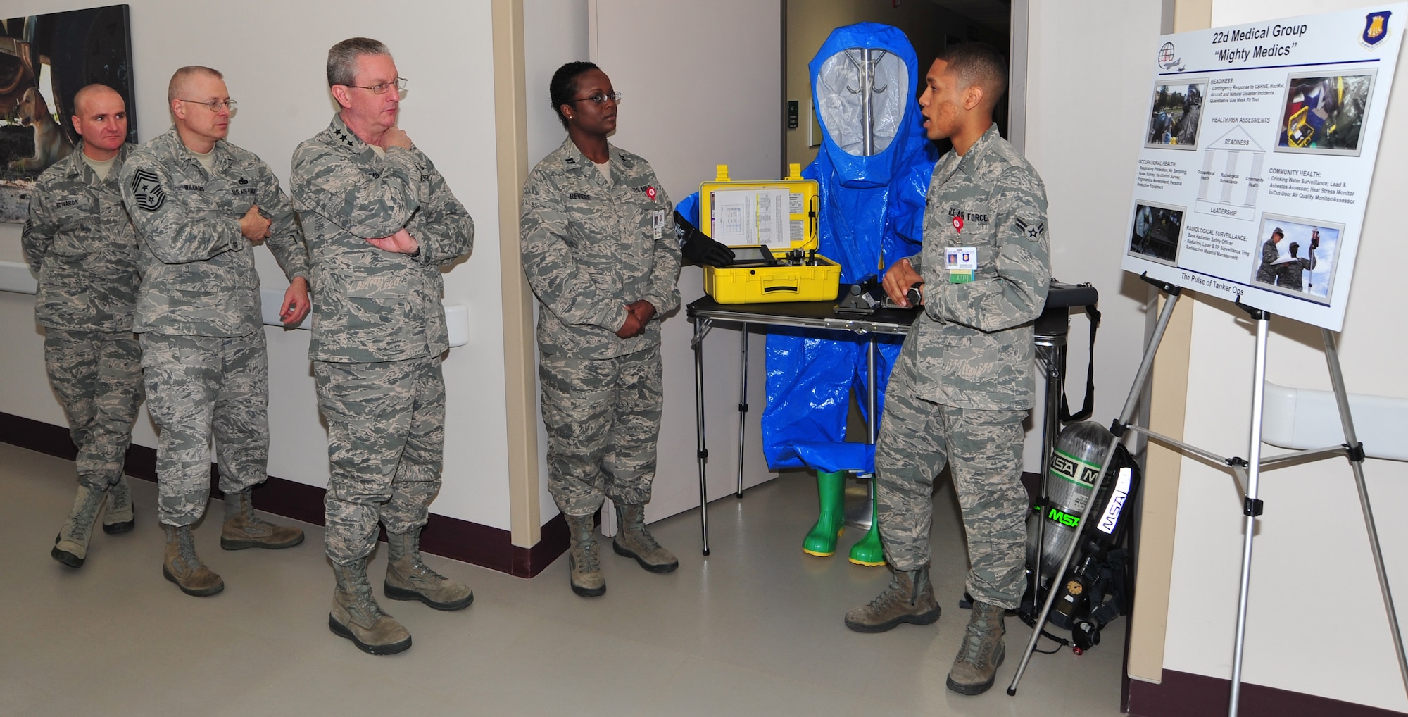 Airman 1st Class Christopher Lange, 22nd Aerospace Medicine Squadron bioenvironmental engineering technician, briefs Lt. Gen. Mark Ramsay, 18th Air Force commander, on the bioenvironmental engineering flight capabilities and base impact Feb. 29, 2012, McConnell Air Force Base, Kan.  Ramsay toured the base for two days to observe the mission and meet with people of the 22nd Air Refueling Wing.  (U.S. Air Force photo/Airman 1st Class Maurice Hodges) 