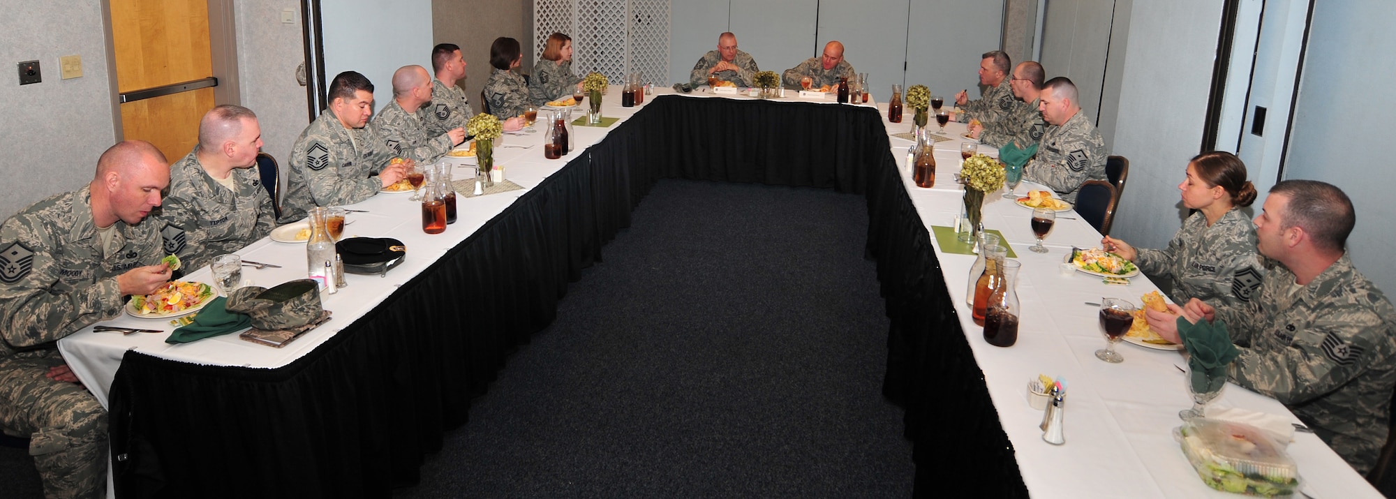 Chief Master Sgt. Jeffrey Williams, 18th Air Force command chief, speaks to base first sergeants during lunch Feb. 29, 2012, McConnell Air Force Base, Kan.  Williams toured the 22nd Air Refueling Wing alongside Lt. Gen. Mark Ramsay, 18th AF commander, to meet with Airmen and speak on issues facing the Air Force today.  The 22nd ARW conducts air refueling and airlift operations worldwide as one of 15 wings under the command of the 18th AF.  (U.S. Air Force photo/Staff Sgt. Maria A. Ruiz) 