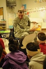 Master Sgt. Jeffrey Mitzelfelt, Air Education and Training Command F-16 special missions weapons manager, reads to students at Paschall Elementary to celebrate
Read Across America, March 2.
(U.S. Air Force photo by Senior Airman Precious Yett)
