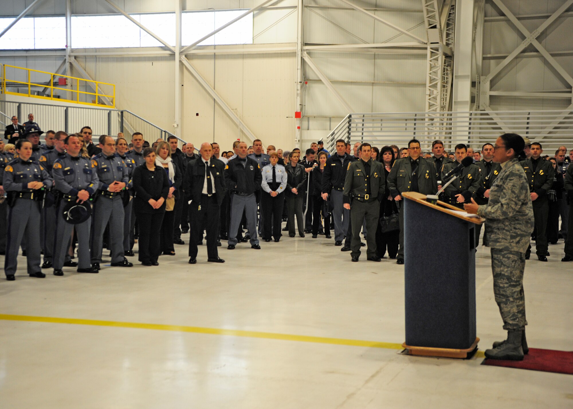 Col. Valerie Hasberry, deputy commander of Joint Base Lewis-McChord, Wash., speaks during a briefing prior to the start of a procession to a memorial service for fallen Washington State Patrol Trooper Tony Radulescu, March 1, 2012, at Joint Base Lewis-McChord, Wash. (U.S. Air Force photo/Staff Sgt. Frances Kriss)