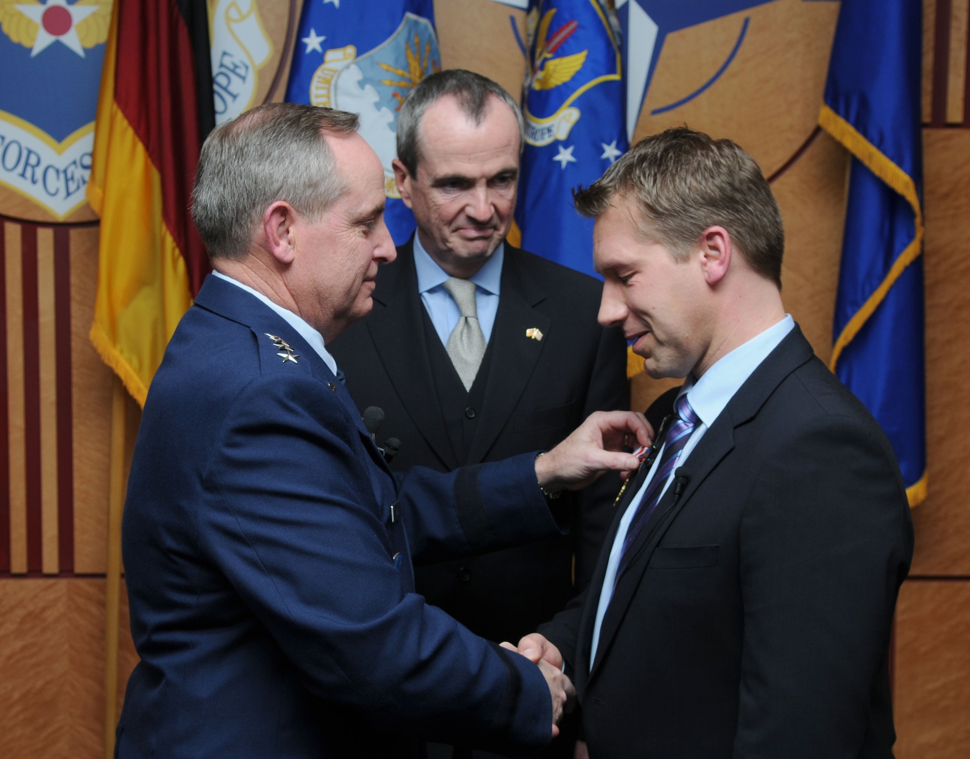 Gen. Mark Welsh, U.S. Air Forces in Europe commander, presented the United States Air Forces Europe Medal of Distinction to Professor Dr. Kai Zacharowski during a ceremony here March 2, 2012. Professor Dr. Zacharowski was honored for his role in saving the lives of two Airmen who were critically injured during a shooting at the Frankfurt International Airport one year ago.  In attendance was the Honorable Philip D. Murphy, U.S. Ambassador to the Federal Republic of Germany (pictured) along with the Dr. Zacharowski's family and military members directly affected by the shooting. (U.S. Air Force photo by Tech. Sgt. Patrick Mitchell) (Released)