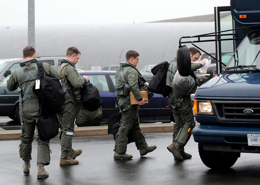 SPANGDAHLEM AIR BASE, Germany -- Pilots from the 480th Fighter Squadron here board a bus headed toward a staging area for the squadron's F-16 Fighting Falcon aircraft March 2 before departing for Anatolian Falcon 2012. AF12 is a weapons-training deployment geared to expanding and honing military interoperability between the U.S. and Turkish air forces. More than 250 Airmen and 15 aircraft will participate in the exercise, which involves air missions to include interdiction, attack, air superiority, defense suppression, airlift, air refueling and reconnaissance. (U.S. Air Force photo by Staff Sgt. Daryl Knee/Released)