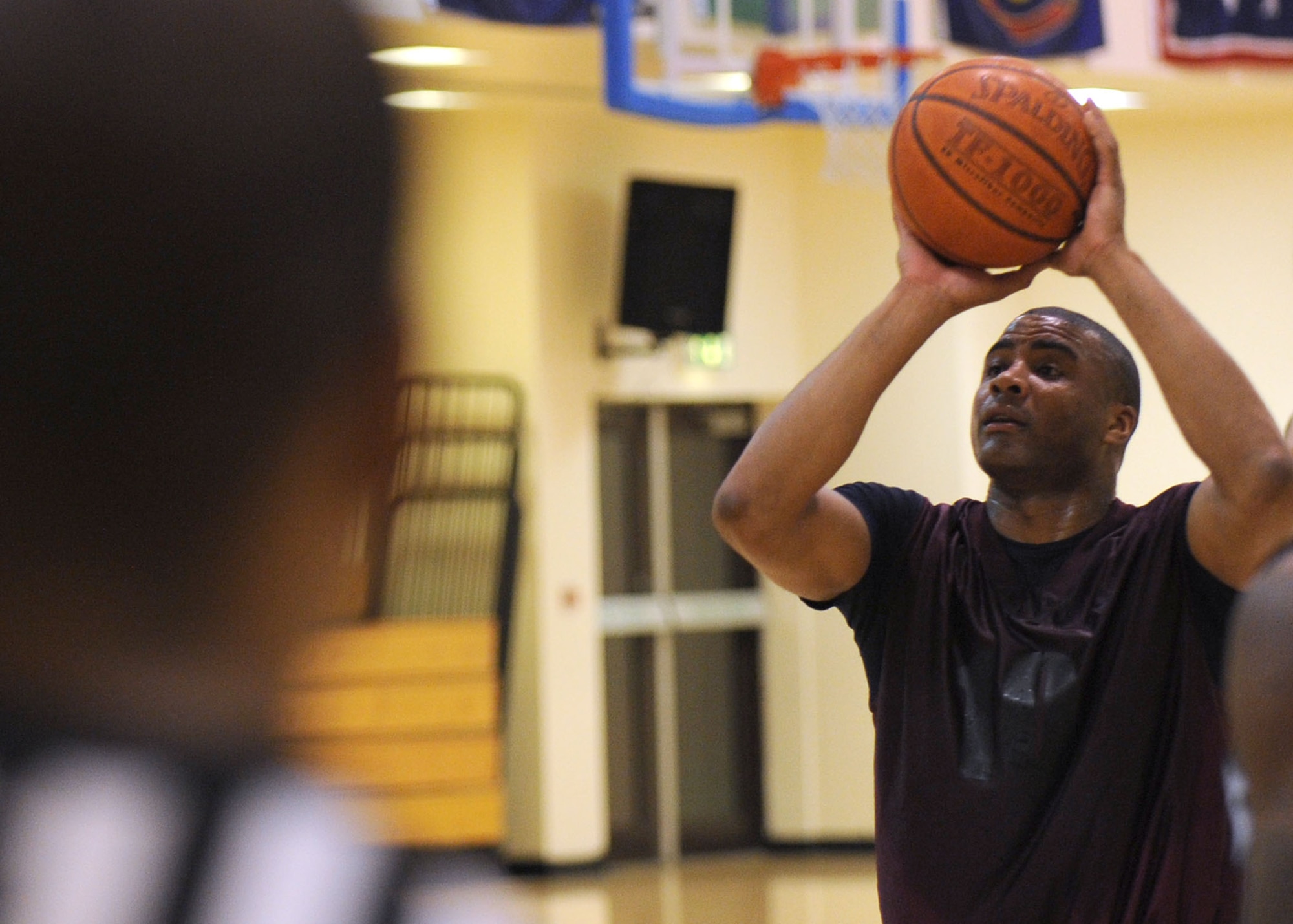 RAF MILDENHALL, England – Byron Washington, 100th Civil Engineer Squadron, shoots a free throw during the RAF Mildenhall Intramural Basketball Championship game here Feb. 28, 2012. The game, between the 100th Civil Engineer Squadron and the 100th Maintenance Group, was close but 100th MXG were able to pull ahead for the win in the second half. (U.S. Air Force photo/Tech. Sgt. Neal X. Joiner) 