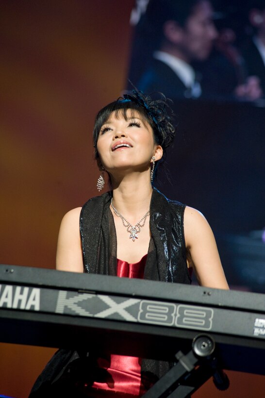 Keiko Matsui, titled the “first lady” of contemporary jazz, performs “Deep Blue” from her new album with the United States Air Force Band during the 47th Annual Guest Artist Series at Daughters of American Revolution Constitution Hall in Washington, D.C., on Feb. 26. Currently releasing her 23rd album, Matsui has numerous highly-acclaimed recordings to her credit including “Saphire” and “Deep Blue” which reached number one on Billboard’s Contemporary Jazz chart recently. (Photo/Bobby Jones)