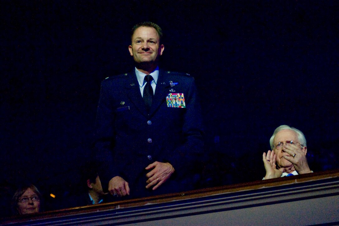 Colonel Ken Rizer, 11th Wing/Joint Base Andrews commander, receives guest acknowledgement at the inception of the 47th Annual Guest Artist Series at Daughters of American Revolution Constitution Hall in Washington, D.C., on Feb. 26. (Photo/Bobby Jones)