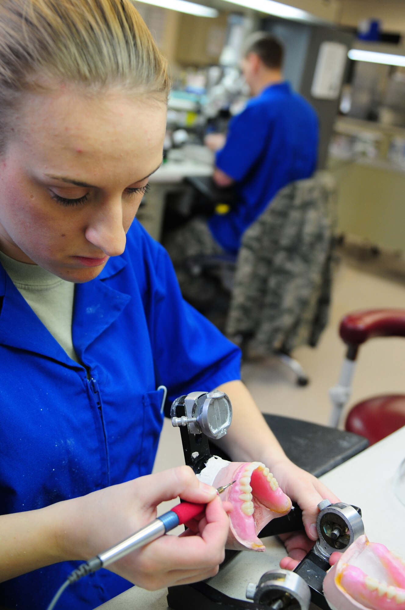 ROYAL AIR FORCE LAKENHEATH, England -- Staff Sgt. Latisha Wood, 48th Dental Squadron dental laboratory technician, waxes a set of dentures, Feb. 28, 2012. The 48 DS won the Air Force Large Dental Clinic for 2011 and is part of the 48th Medical Group, which recently won the Air Force Surgeon General's Best Hospital of the Year for the third year in a row. (U.S. Air Force photo by Senior Airman Lausanne Morgan)