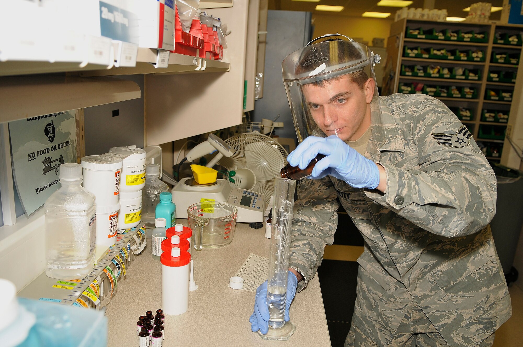 ROYAL AIR FORCE LAKENHEATH, England -- Senior Airman Chad Betty, 48th Medical Support Squadron pharmacy supply custodian, mixes components to make a gel that will be used on physical therapy patients, Feb. 29, 2012. The pharmacy averages 147,000 prescriptions monthly and supports the combat capability of the 48th Fighter Wing, 100th Air Refueling Wing, 501st Combat Support Wing and 352nd Special Operations Group. The pharmacy is part of the 48th Medical Group, which recently won the Air Force Surgeon General's Best Hospital of the Year for a third year in a row. (U.S. Air Force photo by Staff Sgt. Connor Estes)

