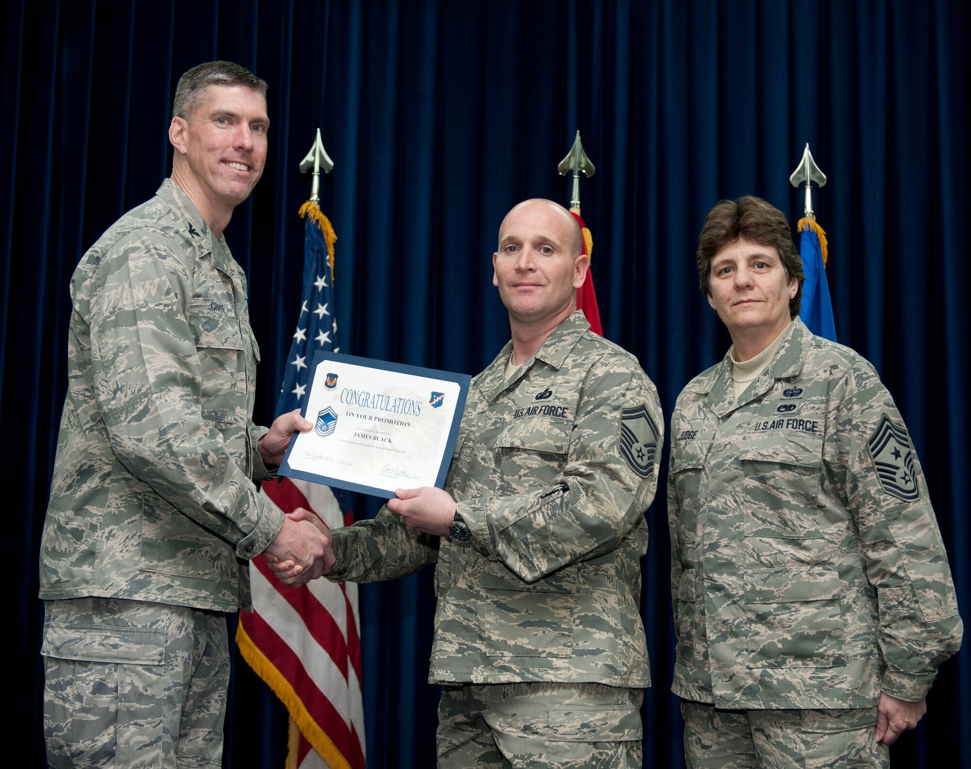 James Black, 39th Contracting Squadron, is promoted to the rank of senior master sergeant Feb. 29, 2012, at the Club Complex ballroom at Incirlik Air Base, Turkey. (U.S. Air Force photo by Senior Airman Clayton Lenhardt/Released)