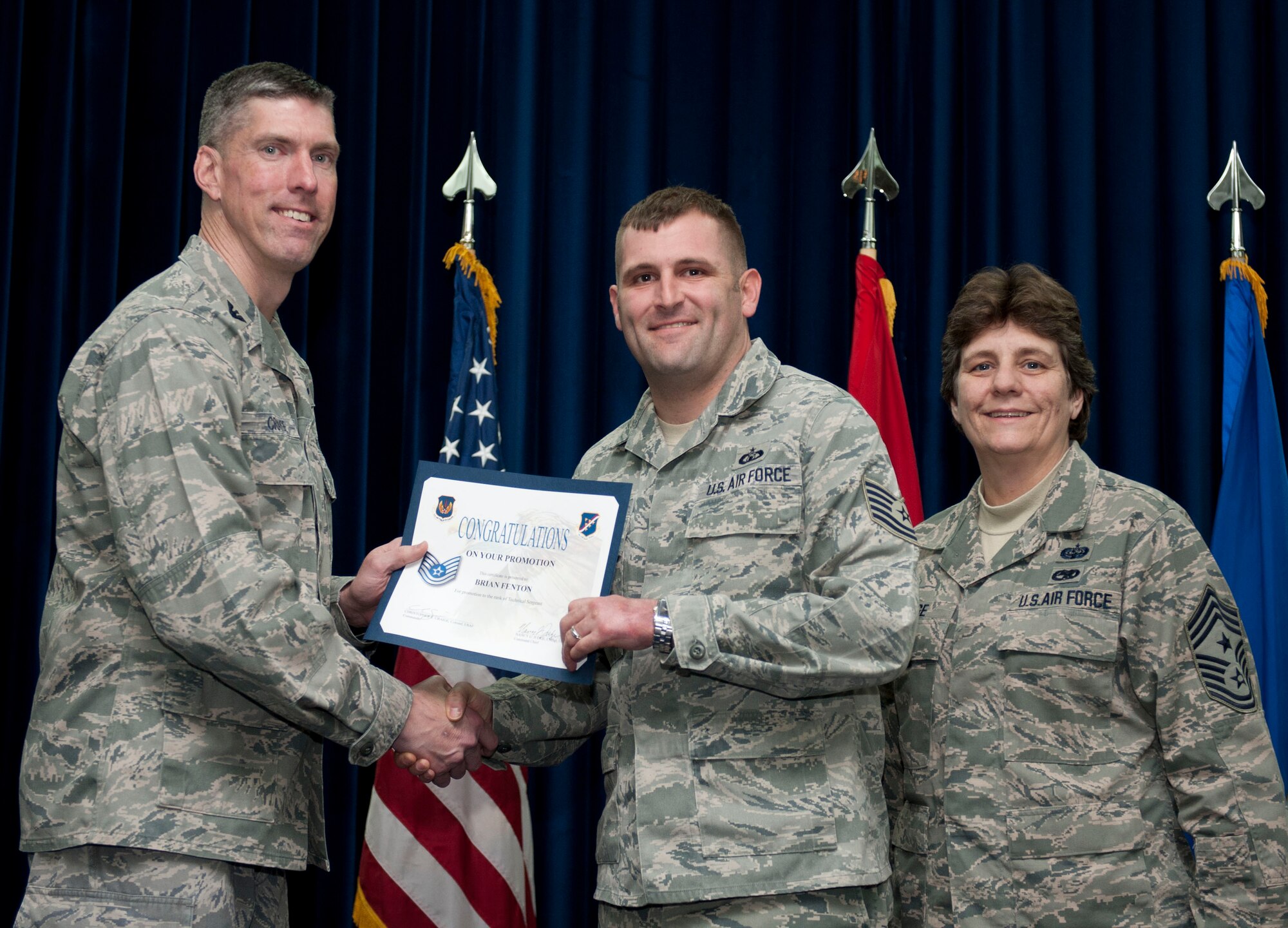 Brian Fenton, 39th Operations Squadron, is promoted to the rank of technical sergeant Feb. 29, 2012, at the Club Complex ballroom at Incirlik Air Base, Turkey. (U.S. Air Force photo by Senior Airman Clayton Lenhardt/Released)