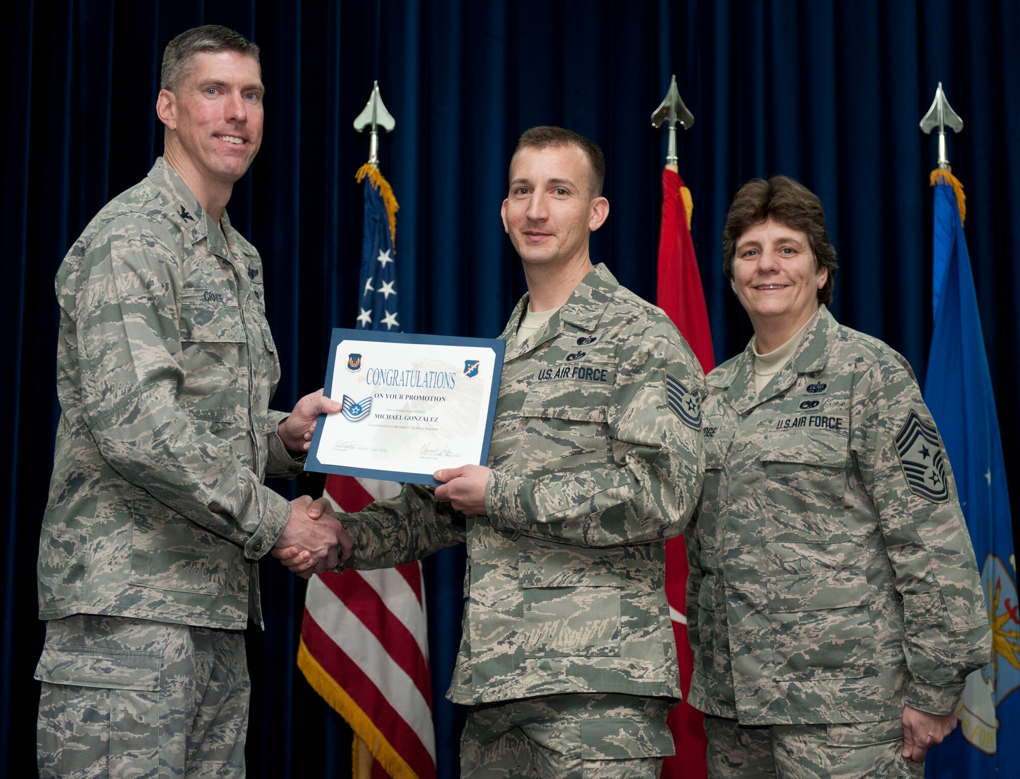 Michael Gonzalez, 39th Civil Engineer Squadron, is promoted to the rank of technical sergeant Feb. 29, 2012, at the Club Complex ballroom at Incirlik Air Base, Turkey. (U.S. Air Force photo by Senior Airman Clayton Lenhardt/Released)