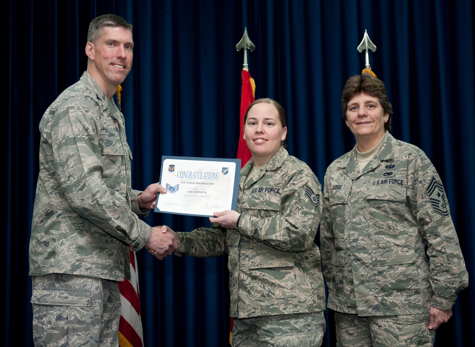 Cara Robbins, 39th Communications Squadron, is promoted to the rank of staff sergeant Feb. 29, 2012, at the Club Complex ballroom at Incirlik Air Base, Turkey. (U.S. Air Force photo by Senior Airman Clayton Lenhardt/Released)