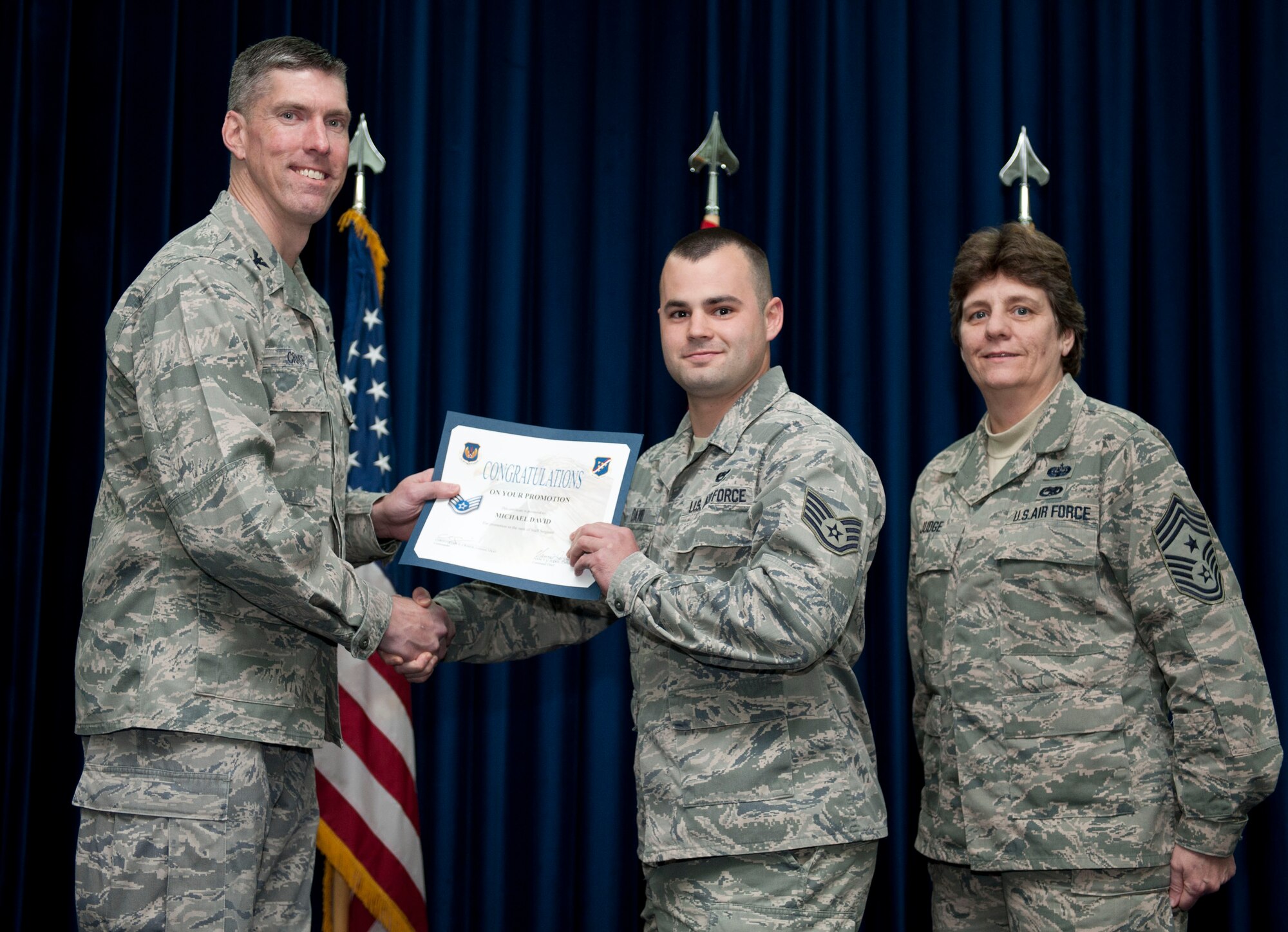 Michael David, 39th Maintenance Squadron, is promoted to the rank of staff sergeant Feb. 29, 2012, at the Club Complex ballroom at Incirlik Air Base, Turkey. (U.S. Air Force photo by Senior Airman Clayton Lenhardt/Released)