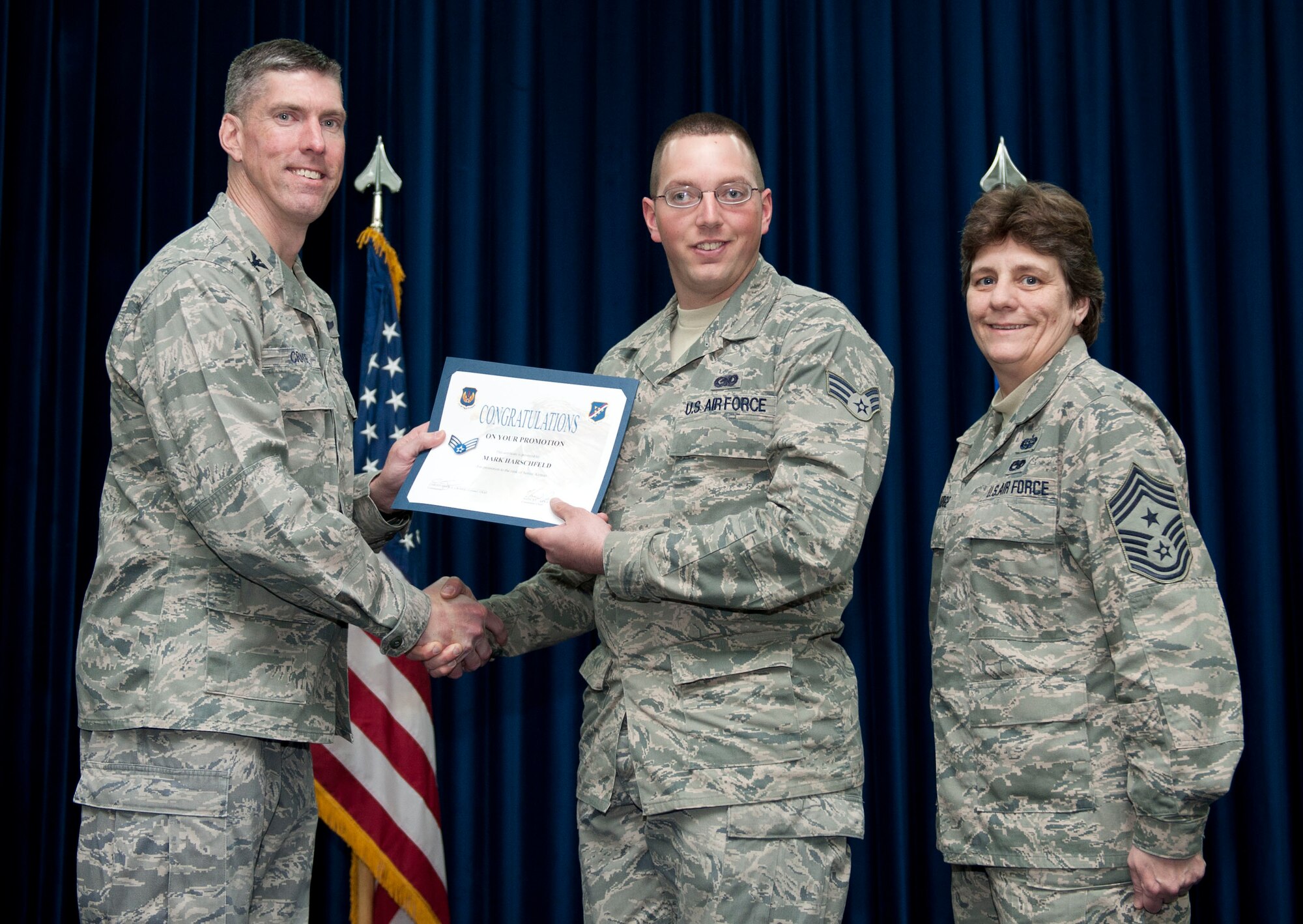 Mark Harschfeld, 39th Logistics Readiness Squadron, is promoted to the rank of senior airman Feb. 29, 2012, at the Club Complex ballroom at Incirlik Air Base, Turkey. (U.S. Air Force photo by Senior Airman Clayton Lenhardt/Released)