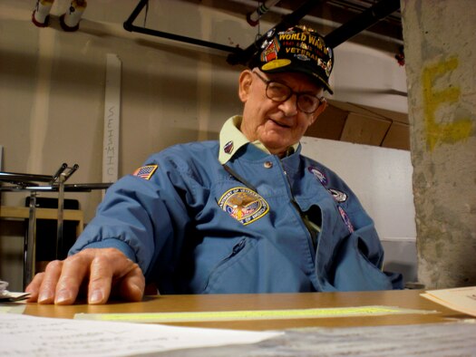 Retired U.S. Army 1st Sgt. Evert “Sarge” Carter takes a break from telling his life story to explain why he loves interacting with current Airmen, Soldiers, Sailors and Marines, Feb. 8, 2012, at the Seattle-Tacoma International Airport USO. Sarge has been volunteering at this USO for 13 years. (U.S. Air Force photo by Senior Airman Brigitte N. Brantley/Released)
