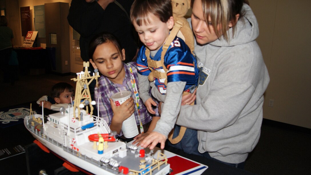 ST. LOUIS, Mo. — Children explore a model of a U.S. Coast Guard vessel as they learn about river navigation Feb. 25 during Engineer Week at the St. Louis Science Center. 