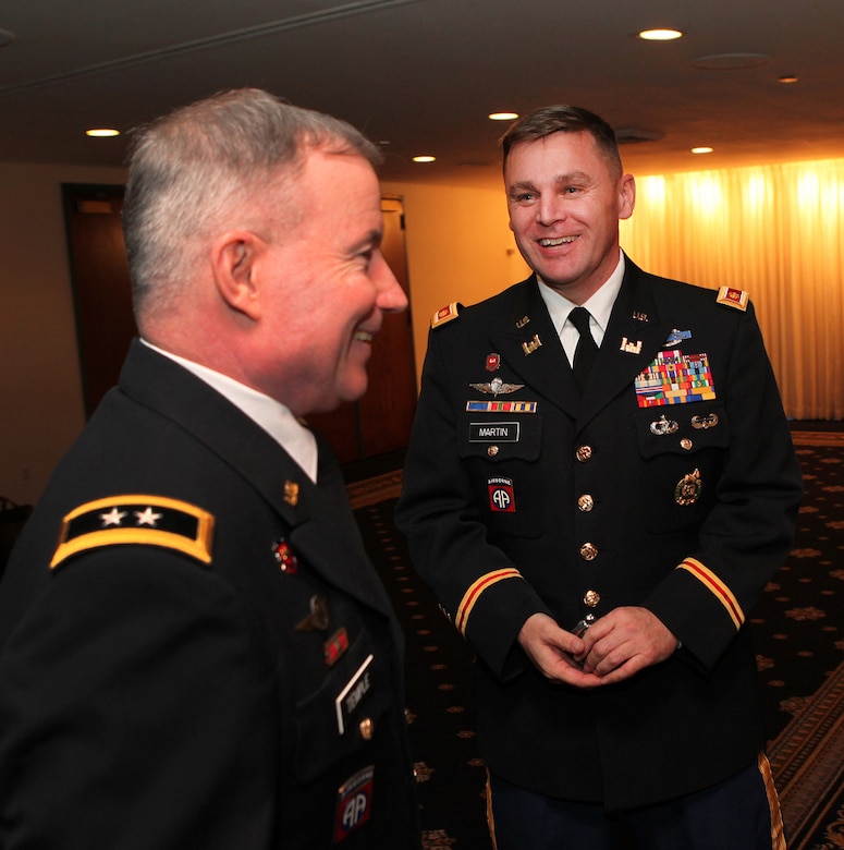 WASHINGTON, D.C. — Oregon Army National Guard Maj. Shaun Martin (right), recipient of the Federal Engineer of the Year award for the Army Corps of Engineers, speaks with Maj. Gen. Merdith W. B. (Bo) Temple, acting chief of engineers and acting commanding general for the Army Corps of Engineers (left foreground), at an awards ceremony here, Feb. 23, 2012. 