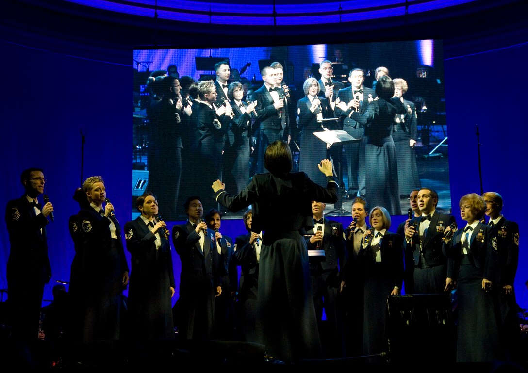 Second Lt. Shanti Nolan, United States Air Force Band conductor, leads the United States Air Force Band’s “Singing Sergeants” in song during the 47th Annual Guest Artist Series at Daughters of American Revolution Constitution Hall in Washington, D.C., on Feb. 26. (Photo/Bobby Jones)