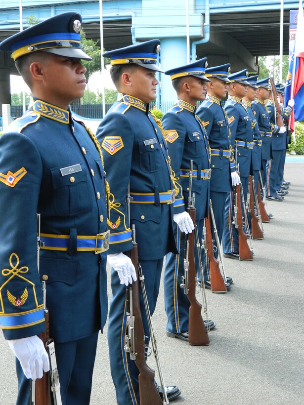 VILLAMOR AIR BASE, Philippines-A squad of Philippine Air Force airmen await the arrival of Lt. Gen. Duane D. Thiessen, commander of U.S. Marine Corps Forces, Pacific, at Villamor Air Base, Sept. 15. Thiessen visited the Philippines to meet with the U.S. ambassador, U.S. and Filipino military officials, and component commanders from the Armed Forces of the Philippines.                               