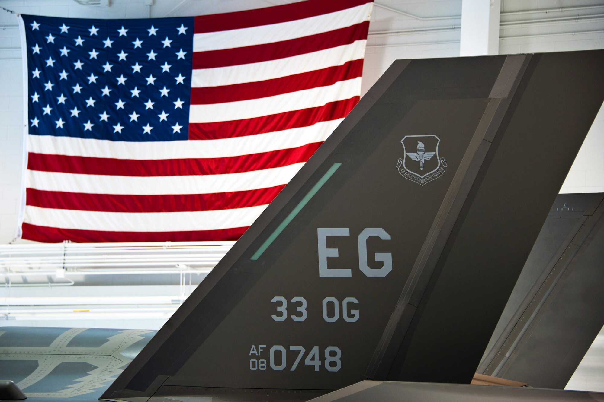 The 33rd Operations Group flagship F-35A Lightning II joint strike fighter sits ready to fly in the Air Force hangar at Eglin Air Force Base, Fla.  The Air Force issued a military flight release Feb. 28 allowing the F-35A to begin initial operations here.  (U.S. Air Force photo/Samuel King Jr.)