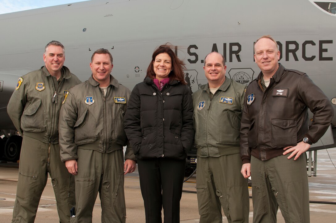 PEASE AIR NATIONAL GUARD BASE, N.H. -- U.S. Sen. Kelly Ayotte stands with (left to right) Senor Master Sgt. Glenn Starkweather, Maj. John Czachor, Master Sgt. Gary Howard and Maj. Jason Denton after her flight which refueled a C-17 high above N.H. Sen. Ayotte flew with the N.H. Air National Guard after posthumously presenting a medal decoration to a WWII Army National Guard member. (National Guard photo by Tech. Sgt. Mark Wyatt/RELEASED)