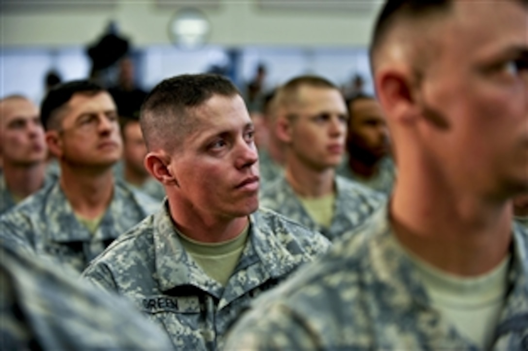 Soldiers assigned to the 101st Airborne Division listen as Defense Secretary Leon E. Panetta speaks during his visit to Fort Campbell, Ky., March 2, 2012.