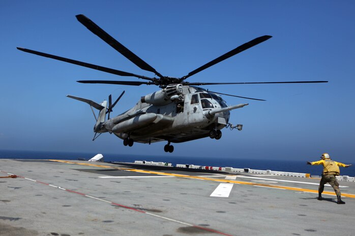 A CH-53E Sea Stallion helicopter with Marine Medium Helicopter Squadron 265 (Reinforced), 31st Marine Expeditionary Unit, lands on the flight deck of the Essex, March 3. The helicopters were flying onto the USS Essex to join the 31st MEU for its upcoming deployment to the Asia Pacific region. The 31st MEU is the only continuously forward-deployed MEU and remains the nation’s force in readiness in the Asia-Pacific region.
