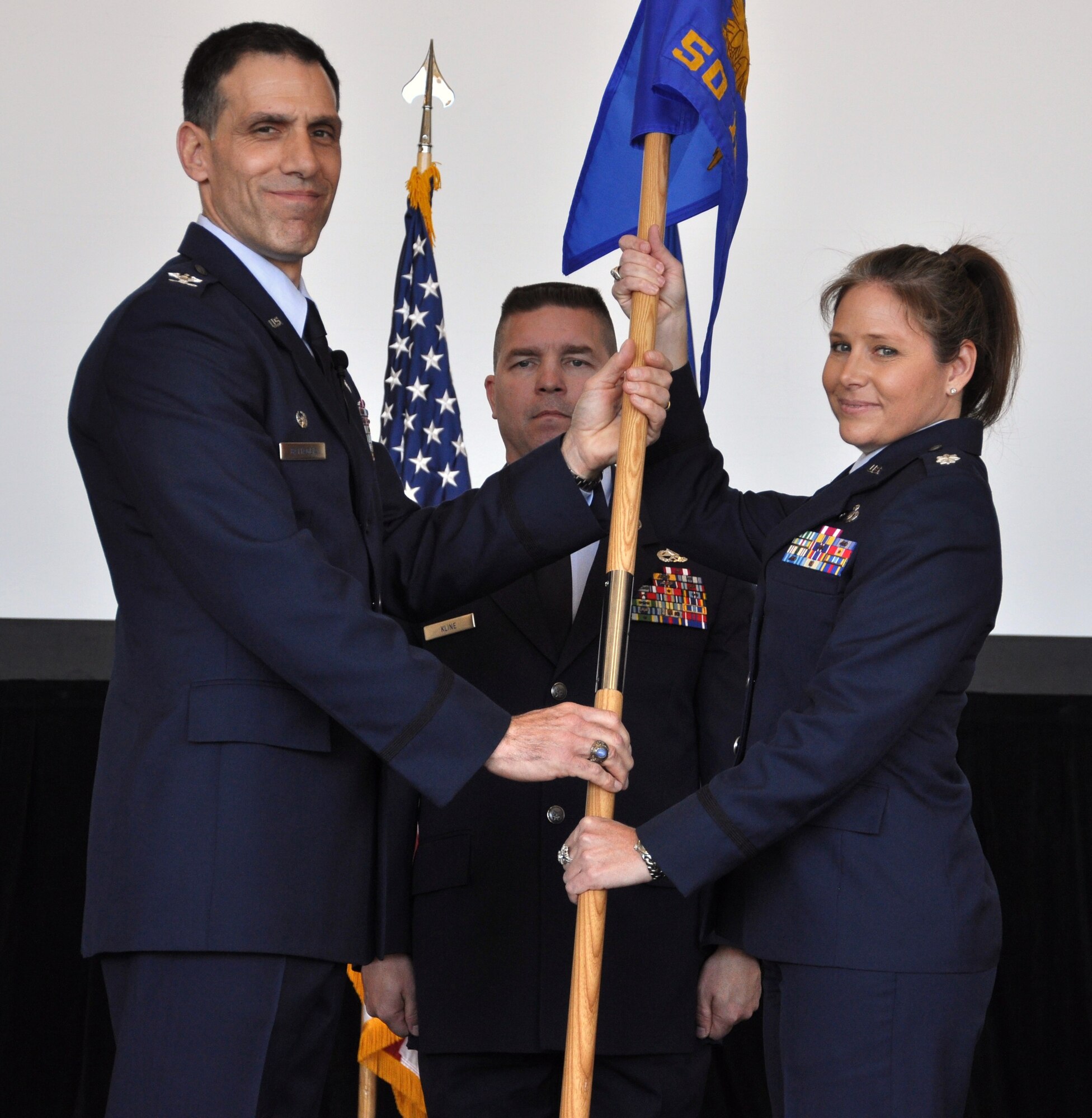 Lt. Col. Leslie Beavers takes command of the 50th Intelligence Squadron from Col. Joseph Battaglia, 940th Operations Group Commander, during a Change of Command ceremony, March 3, 2012, at Beale Air Force Base, Calif. Lt. Col. Beavers was previously assigned to Fourth Air Force at March Air Reserve Base, Calif., where she served as the Deputy Chief, Intelligence, Surveillence, and Reconnaissance. (U.S. Air Force photo by Senior Airman Adam Hamar/Released)
