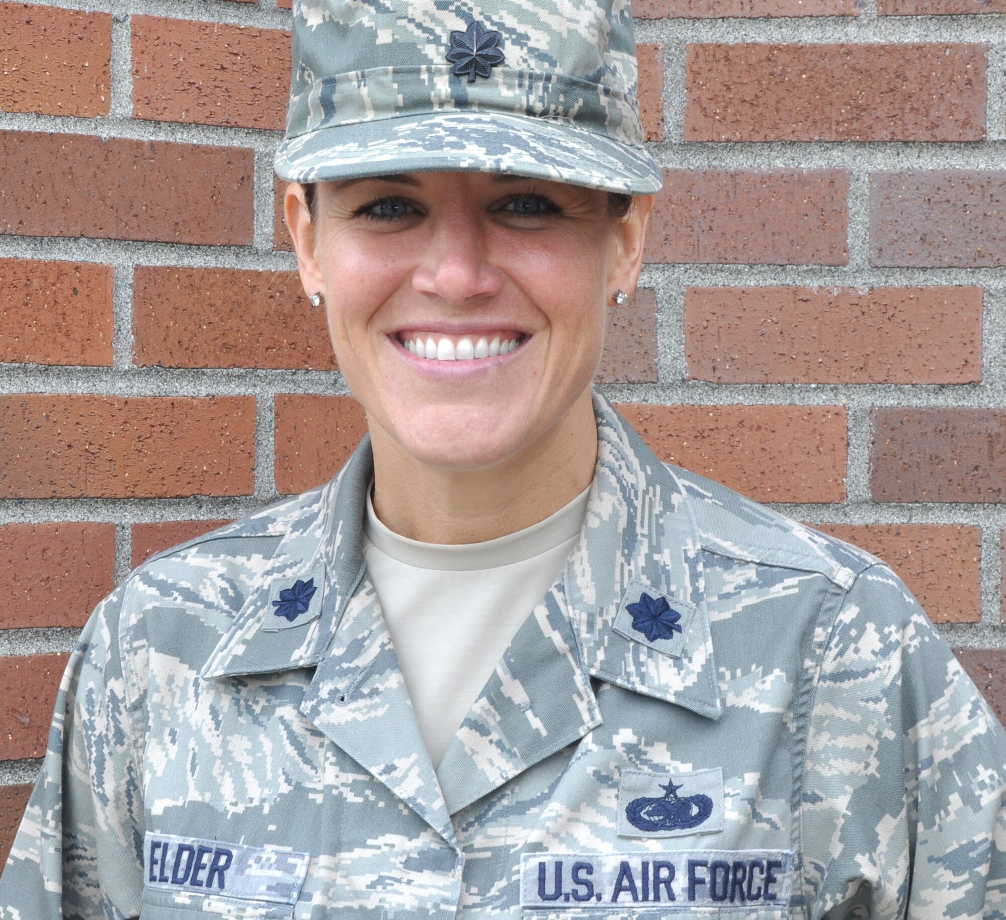 MCCHORD FIELD, Wash. - Lt. Col. Maggie Elder, 36th Aerial Port Squadron operations officer here, finished first in the women’s division and placed eighth overall in a Half Ironman competition Feb. 19 in Corpus Christi, Texas.  An Ironman 70.3, also known as a Half Ironman, is a three-part race that involves a 1.2-mile swim, followed by a 56-mile bike ride, ending with a grueling 13.1-mile run that is both a mental and physical challenge.  (U.S. Air Force photo by Tech. Sgt. Elizabeth Moody)