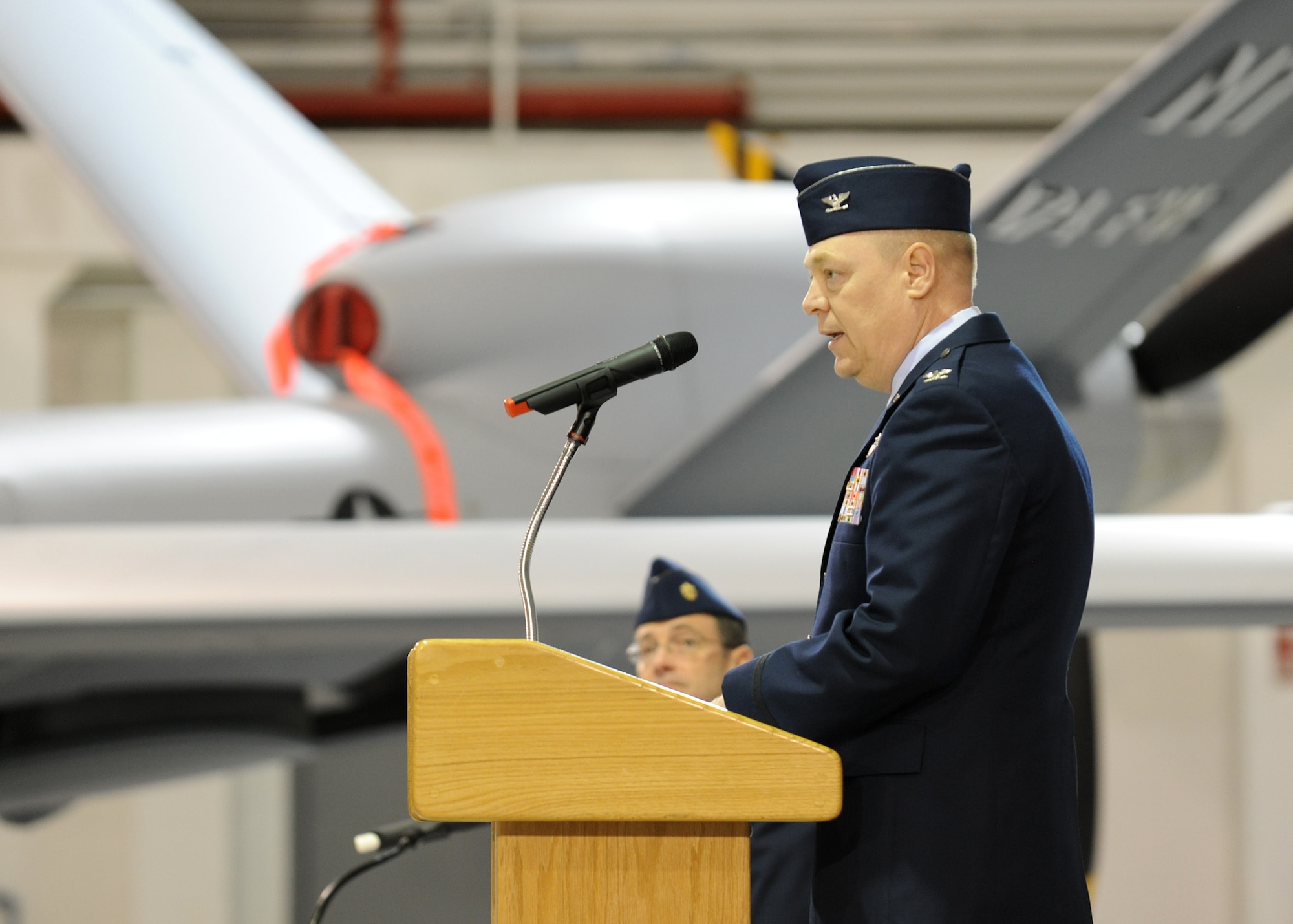 U.S. Air Force Col. Kevin W. Bradley addresses family and friends as well as military and civilian unit members of the 174th Fighter Wing at Hancock Field in Syracuse, NY on 4 March 2012.  Bradley was giving his final speech as the Commander of the 174th during the Change of Command ceremony.  Bradley expressed his appreciation of the men and woman of Hancock Field and his family who made his four years as the Commander a success.  (U.S. Air Force photo by Tech. Sgt. Jeremy M. Call/Released)
