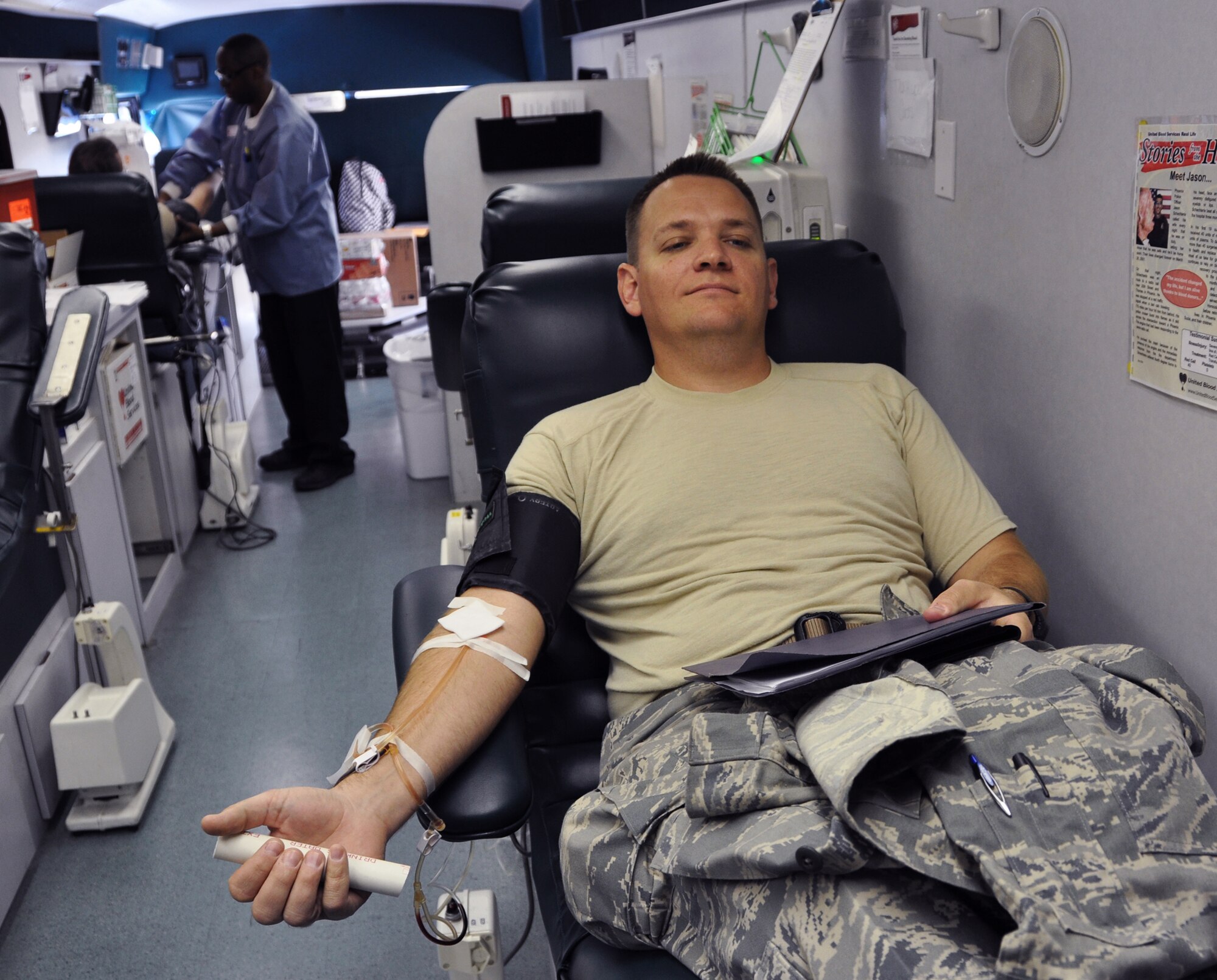 Major Kip M. Schlum, 944th Security Forces Squadron commander, takes time out of his busy day to donate blood during the 944th Fighter Wing “Find the Hero in You” Blood Drive March 4.   (U.S. Air Force photo by Staff Sgt. Denise Willhite)