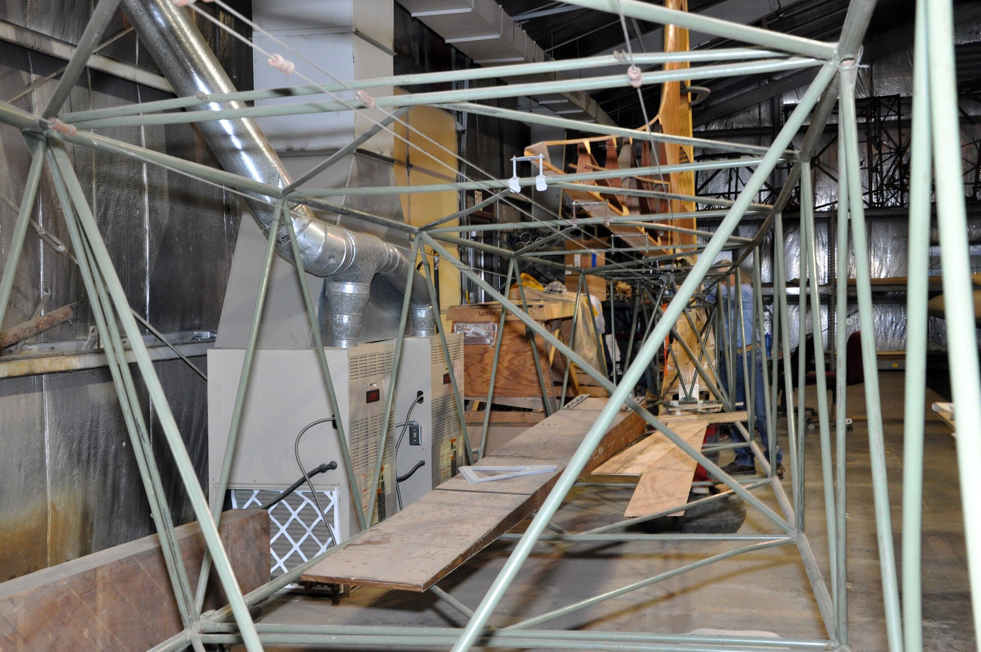 Interior view of the midsection to tail of a CG-4A glider being restored by volunteers at Whiteman Air Force Base, Mo., Feb. 28. The 442nd Fighter Wing is an A-10 Thunderbolt II Air Force Reserve unit at Whiteman. (U.S. Air Force photo/Senior Airman Wesley Wright) 
 
