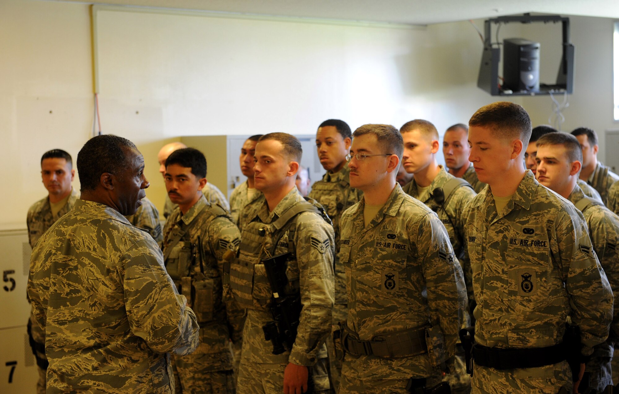 U.S. Air Force Brig. Gen. Jimmy E. McMillian, Director of Security Forces, Deputy Chief of Staff for Logistics, Installations and Mission Support, Headquarters U.S. Air Force, addresses the 18th Security Forces Squadron, Bravo Flight personnel at guardmount during his visit to Kadena Air Base, Japan, March 5, 2012. Guardmount is the military ceremony of installing the new guard and relieving the old one. (U.S. Air Force photo by Airman 1st Class Justin Veazie/released)
