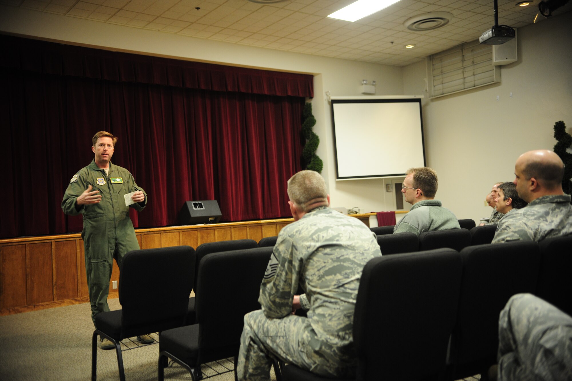 Col. Wyn Elder, left, 62nd Airlift Wing commander, conducts a question and answer session during a monthly Top 3 Association meeting March 2, 2012, at the McChord Field Chapel Support Center on Joint Base Lewis-McChord, Wash. The group of E-7 and above asked the commander questions concerning topics such as physical fitness testing, the upcoming Operational Readiness Inspection and energy efficiency tactics. (U.S. Air Force photo/Airman 1st Class Leah Young)