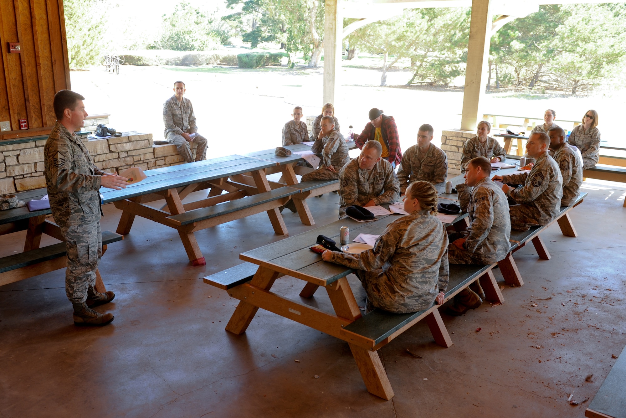 VANDENBERG AIR FORCE BASE, Calif. -- Master Sgt. Scott Munden, the 30th Force Support Squadron career assistance adviser, talks to Lunch-and-Learn participants about retraining options at Cocheo Park here Friday, March 2, 2012. Team V members that attended the event learned how to assist their troops and themselves if they decide to retrain. (U.S. Air Force photo/Staff Sgt. Levi Riendeau)