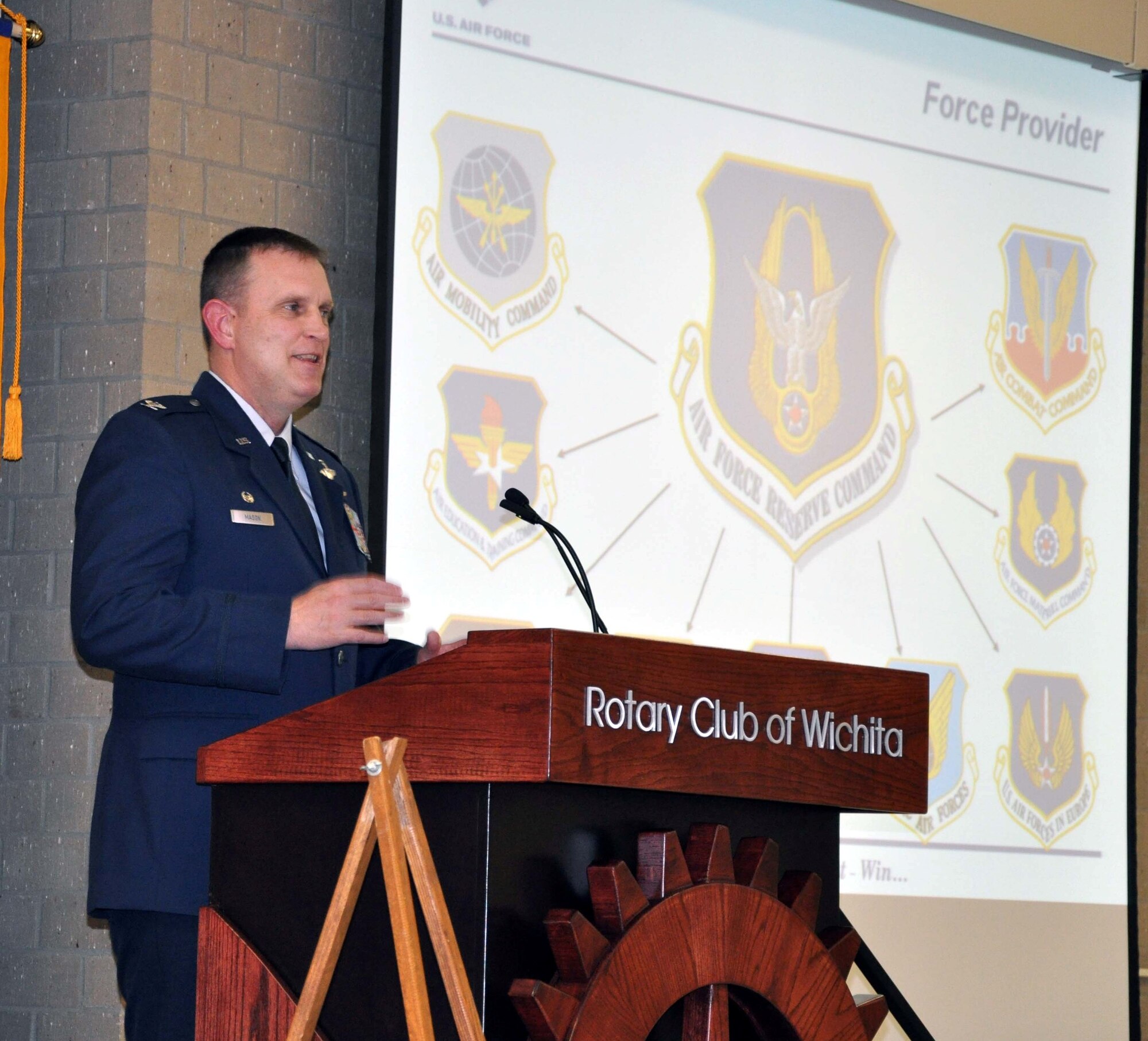 Col. William H. Mason, commander of the 931st Air Refueling Group, McConnell Air Force Base, Kan., speaks at a luncheon hosted by the Wichita Rotary Club in downtown Wichita, March 5, 2012.  Mason presented those in attendence with a unit mission brief that explained the Air Force Reserve and discussed the important role the 931st plays in the mission at McConnell.  Mason also answered several questions from the audience about the 931st and the Air Force Reserve.  (U.S. Air Force photo by 1st Lt. Zach Anderson)