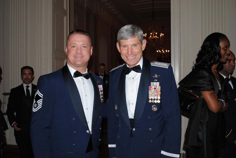 Senior Master Sgt. Donnie Bolton, 21st Security Forces Squadron, Gen. Norton Schwartz, Chief of Staff for the Air Force, Feb. 29 at The White House. Bolton and other service members representing the 50 states were invited to the White House for a dinner dubbed "A Nation's Gratitude: Honoring Those Who Served in Operation Iraqi Freedom and Operation New Dawn." (Courtesy photo)