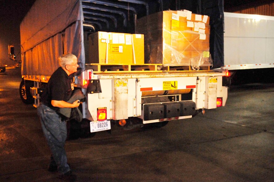 Robert Cleveland, Defense Logistics Agency, prepares to unload a truck during the early morning hours. (U.S. Air Force photo by Sue Sapp)