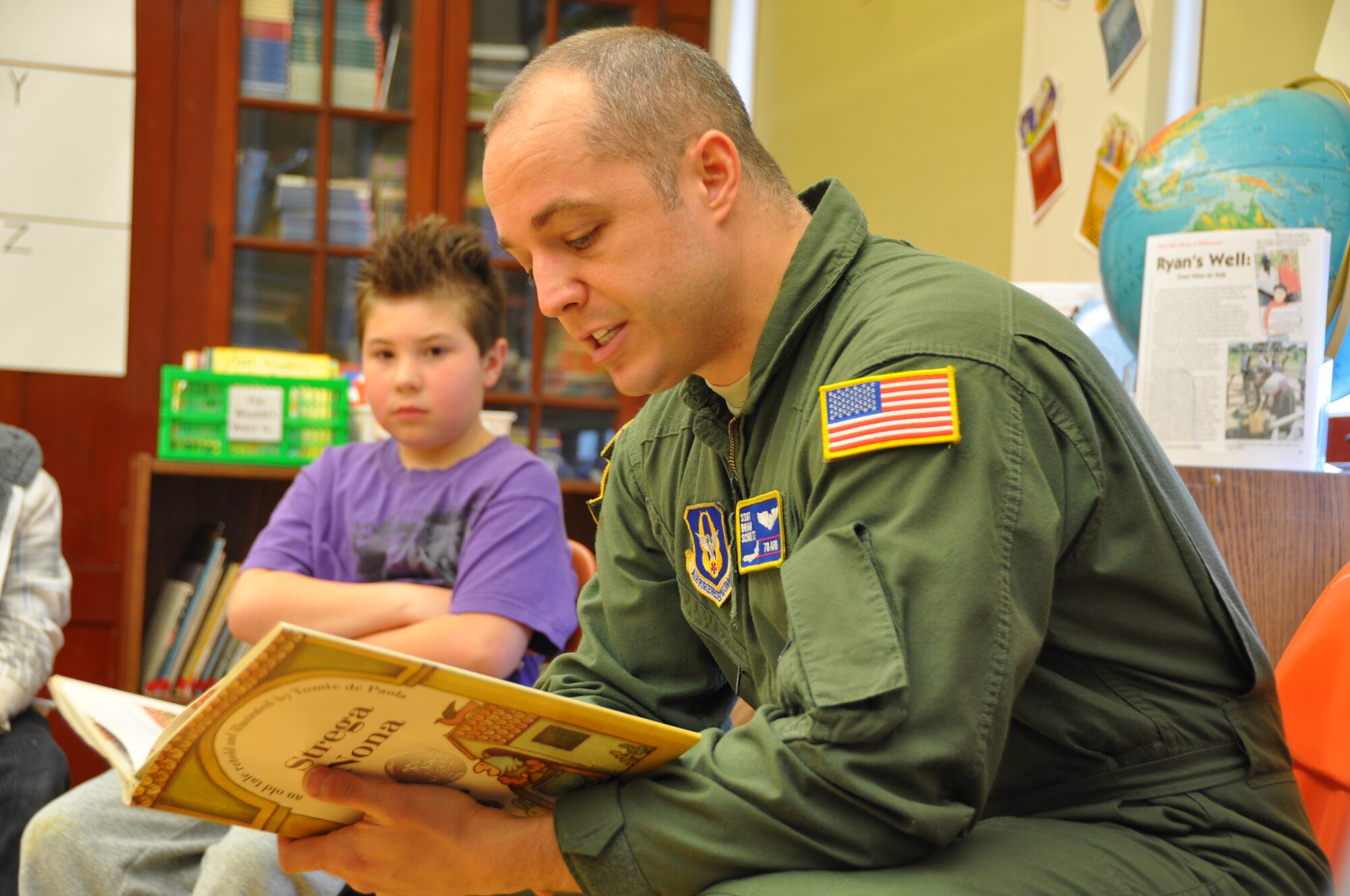 JOINT BASE MCGUIRE-DIX-LAKEHURST, N.J. - Staff Sgt. Brian Schultz is one of several Reserve Airmen who volunteered March 2 to read to students at New Hanover School in Wrightstown, N.J as part of Read Across America; a nationwide reading celebration that takes place annually on Dr. Seuss’s birthday. (U.S. Air Force photo/Master Sgt. Donna T. Jeffries)