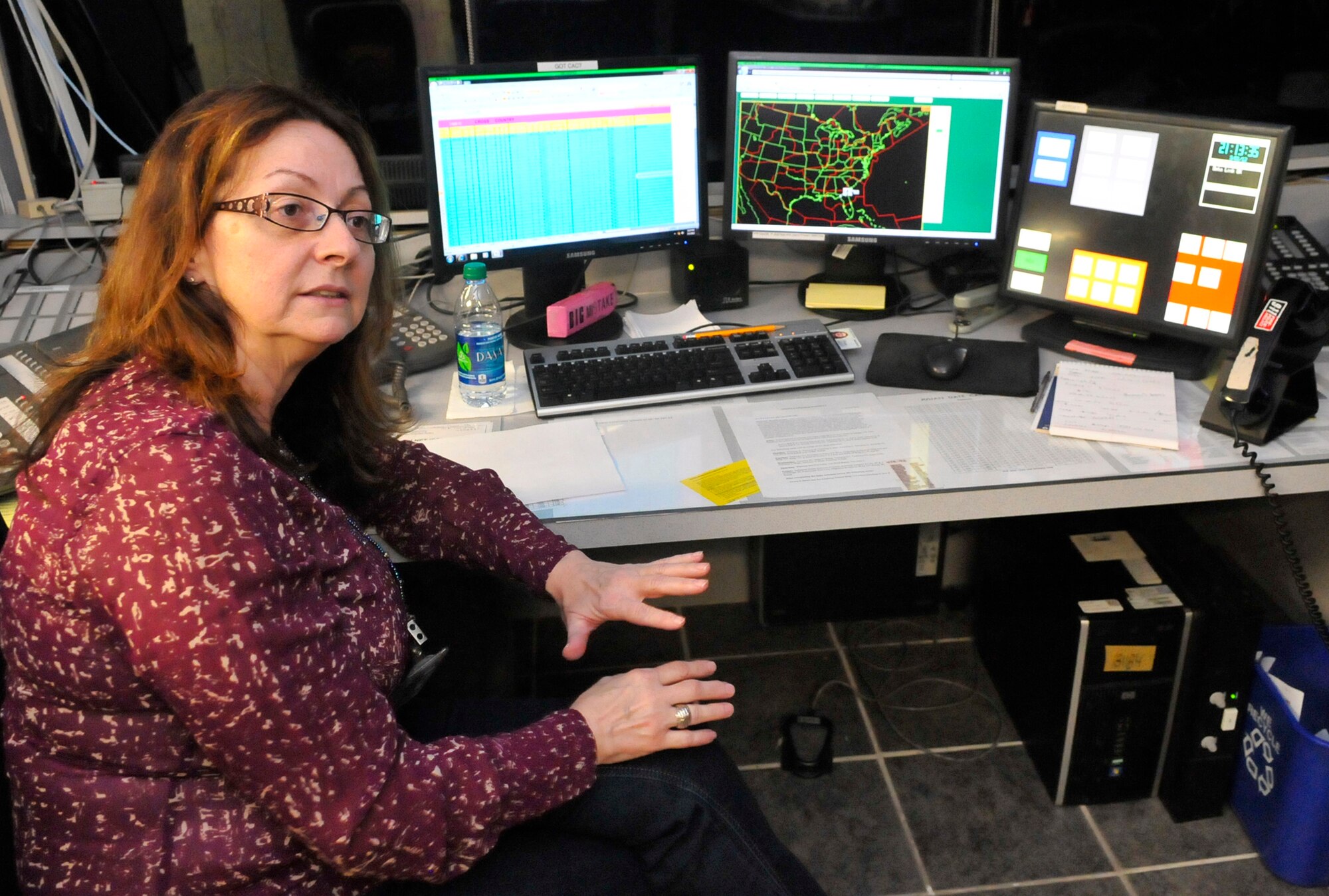 Andrea Lancaster in Base Ops shows a situational display that can pinpoint the location of an aircraft and the length of time before it reaches Robins. (U. S. Air Force photo by Sue Sapp)