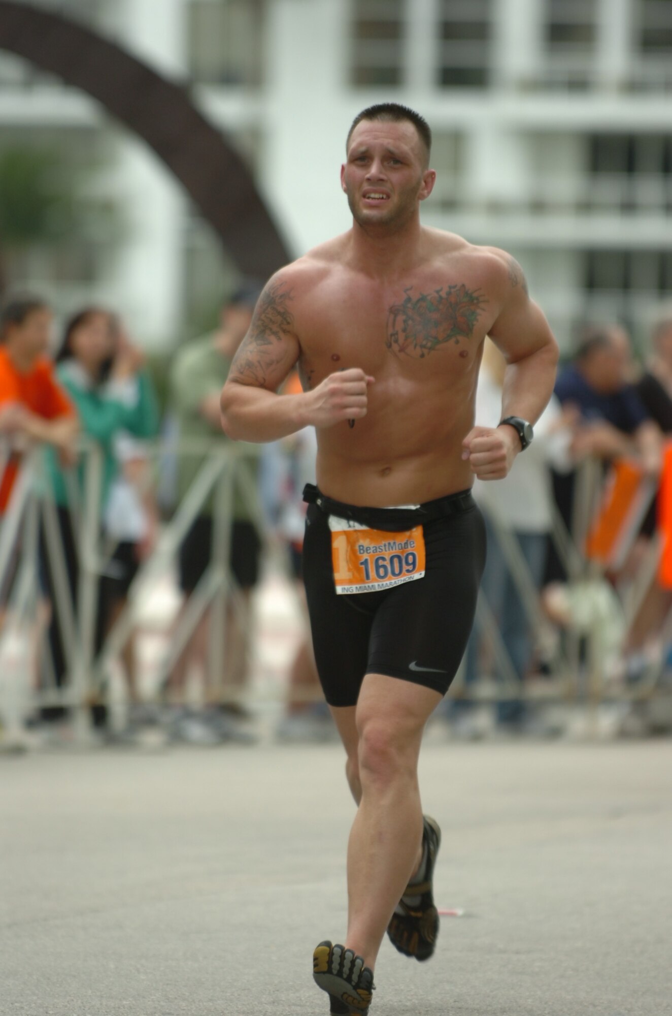 U.S. Air Force Staff Sgt. John Music, 23d Component Maintenance Squadron security manager, runs the ING Miami Marathon Jan. 29, 2012. More than 25,000 people ran in the marathon in either the 5k, half-marathon or full marathon categories. (Courtesy photo) 
