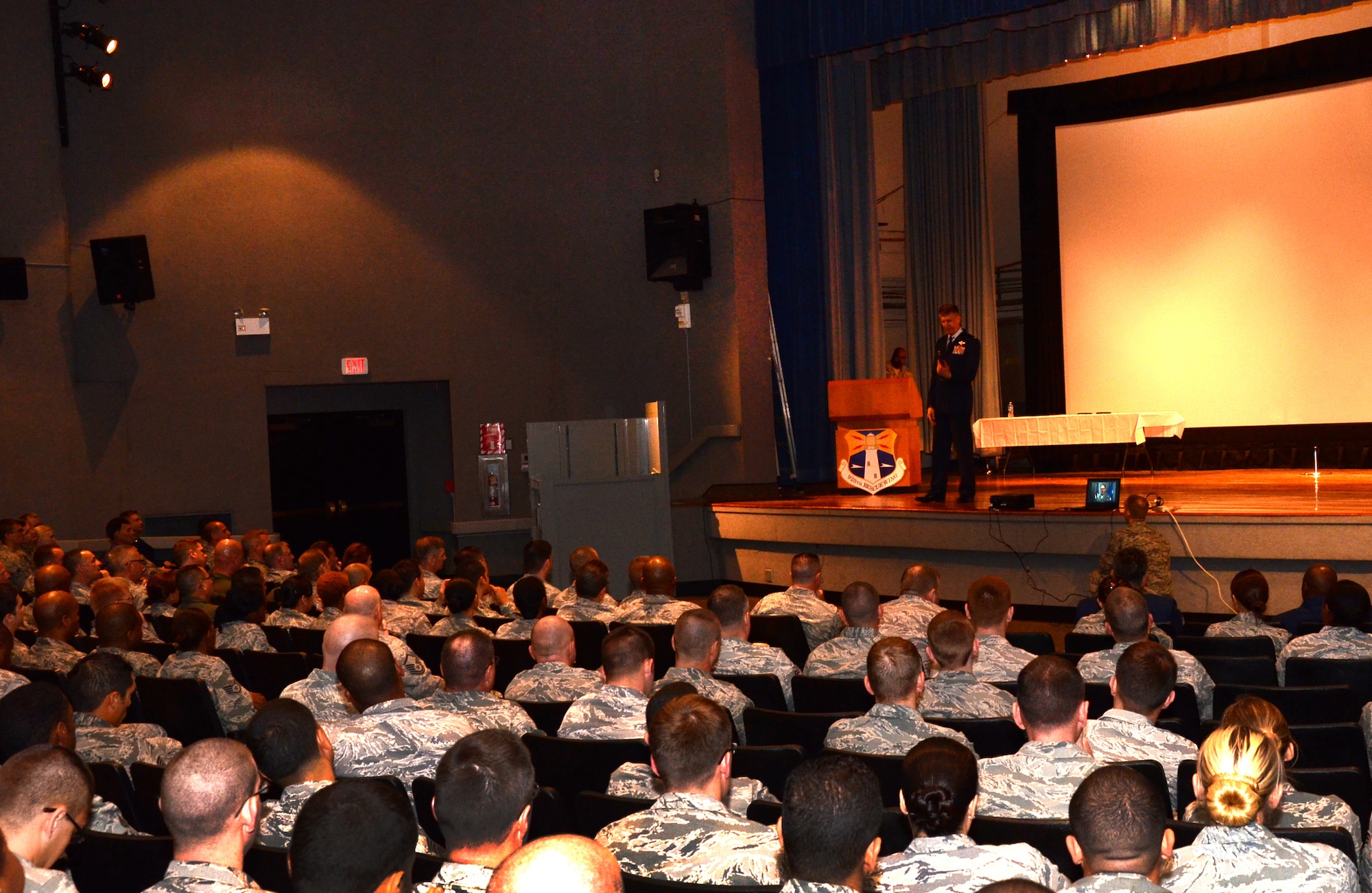 Col. Jeffrey Macrander, 920th Rescue Wing Commander, briefs reservists here on the Wingman Concept during March 4th's Unit Training Assembly.  The briefing covers the idea of knowing your peers well enough to be aware of potential problems they may be facing. It also asks everyone to be aware of the 4 Pillars of Comprehensive Fitness; mental, physical, social and spiritual. (U.S. Air Force photo/2nd Lt. Leslie Forshaw)