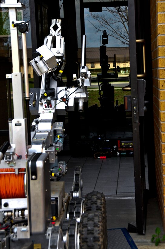 The F6A robot moves toward an improvised explosive device during a recent Chemical, Biological, Radiological, Nuclear Improvised Explosive Device exercise at Hurlburt Field.  The exercise provided training on the 500-pound robot platform.  The robot is used to safely conduct EOD operations without the operator having to expose himself to an explosive device.  (U.S. Air Force photo/Tech. Sgt. Jasmin Taylor)