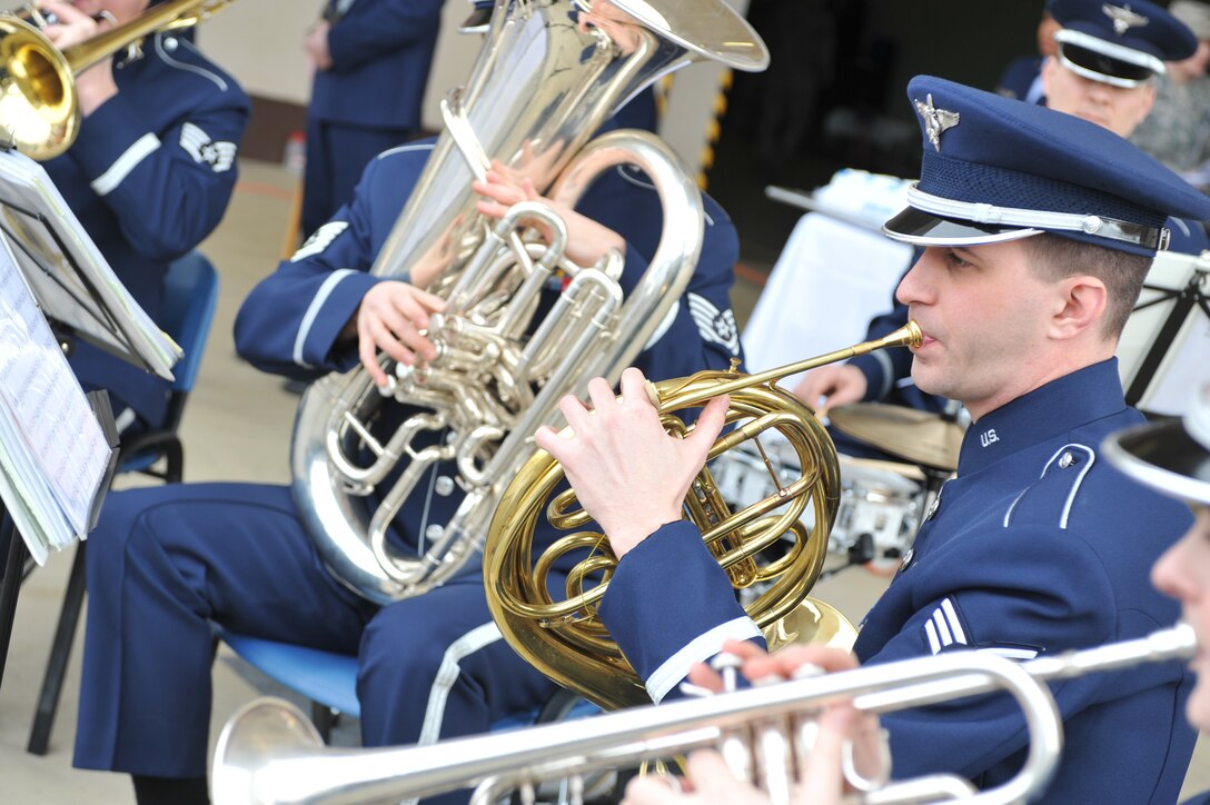 SrA Andy Peck joined the Five Star Brass on horn for this performance.