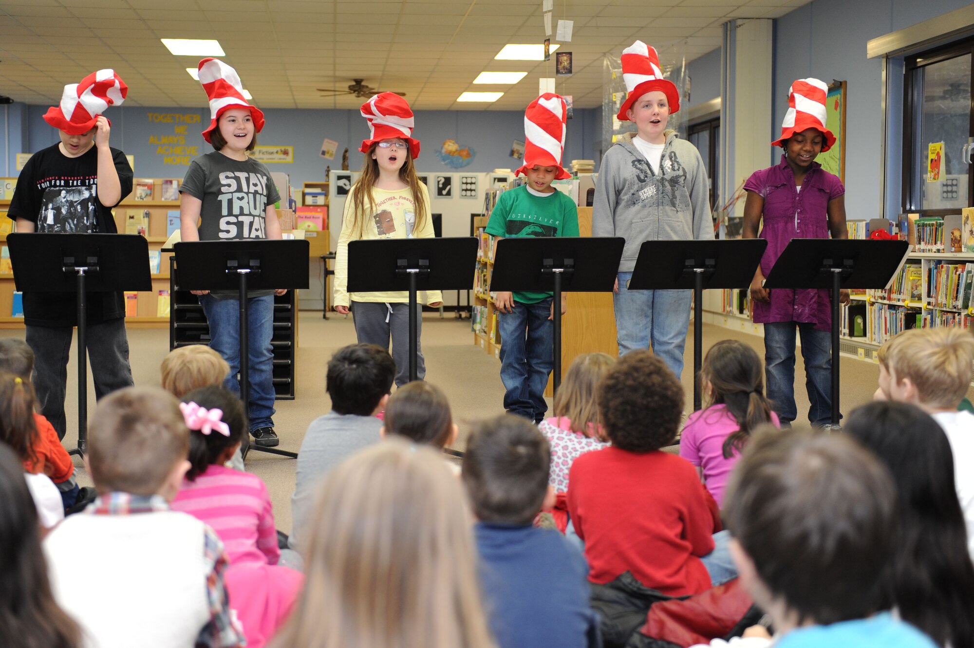 SPANGDAHLEM AIR BASE, Germany –Fourth grade Students read to Mr. Jeffrey Watts’ kindergarten class during Read a Across America event at Spangdahlem Elementary School here March 5. The fourth grade students practiced once a day for two weeks to prepare for readers theater, one of the ways students show the importance of reading. (U.S. Air Force photo by Senior Airman Christopher Toon/Released)

