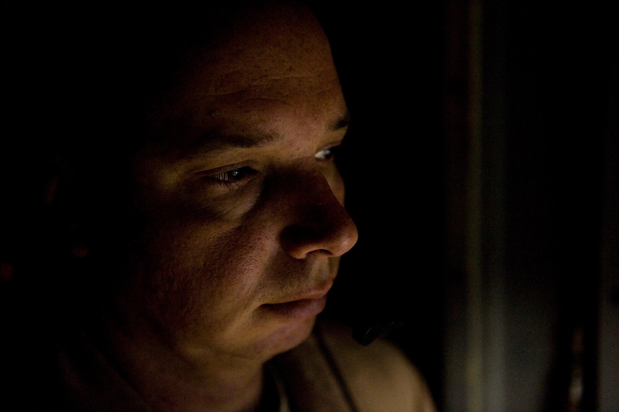 Capt. Mitchell Hudson, a E-3 Sentry (AWACS) navigator with the 964th Expeditionary Airborne Air Control Squadron, monitors flight plans over Afghanistan, Feb. 29, 2012. The mission of the 964th EAACS is to provide an accurate, real-time picture of the battlespace to the Joint Air Operations Center. The E-3 Sentry crew also provides situational awareness of friendly, neutral and hostile activity, command and control of an area of responsibility, battle management of theater forces, all-altitude and all-weather surveillance of the battle space, and early warning of enemy actions during joint, allied, and coalition operations. (U.S. Air Force photo by Staff Sgt. Greg C. Biondo)(Released)
