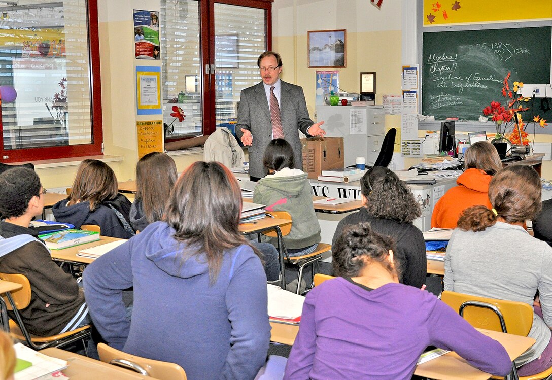 WIESBADEN, Germany — Ben Jones, an architect with the U.S. Army Corps of Engineers Europe District, talks about his profession with math students at Wiesbaden Middle School Feb. 23, 2012.