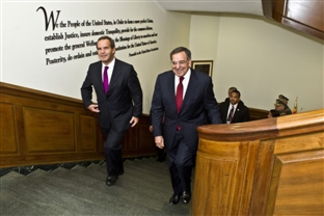 Defense Secretary Leon E. Panetta welcomes Chilean Defense Minister Andres Allamand Zavala to the Pentagon, March 5, 2012.