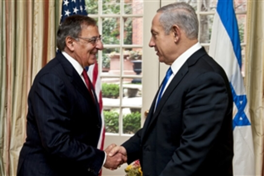 U.S. Defense Secretary Leon E. Panetta greets Israeli Prime Minister Benjamin Netanyahu before a meeting at Blair House in Washington, D.C., March 5, 2012.